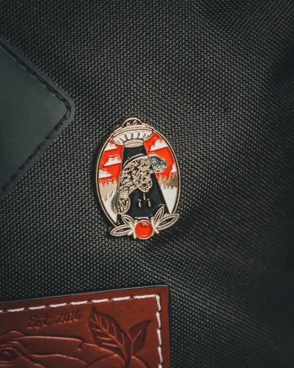 Manatee Abduction Enamel Pin